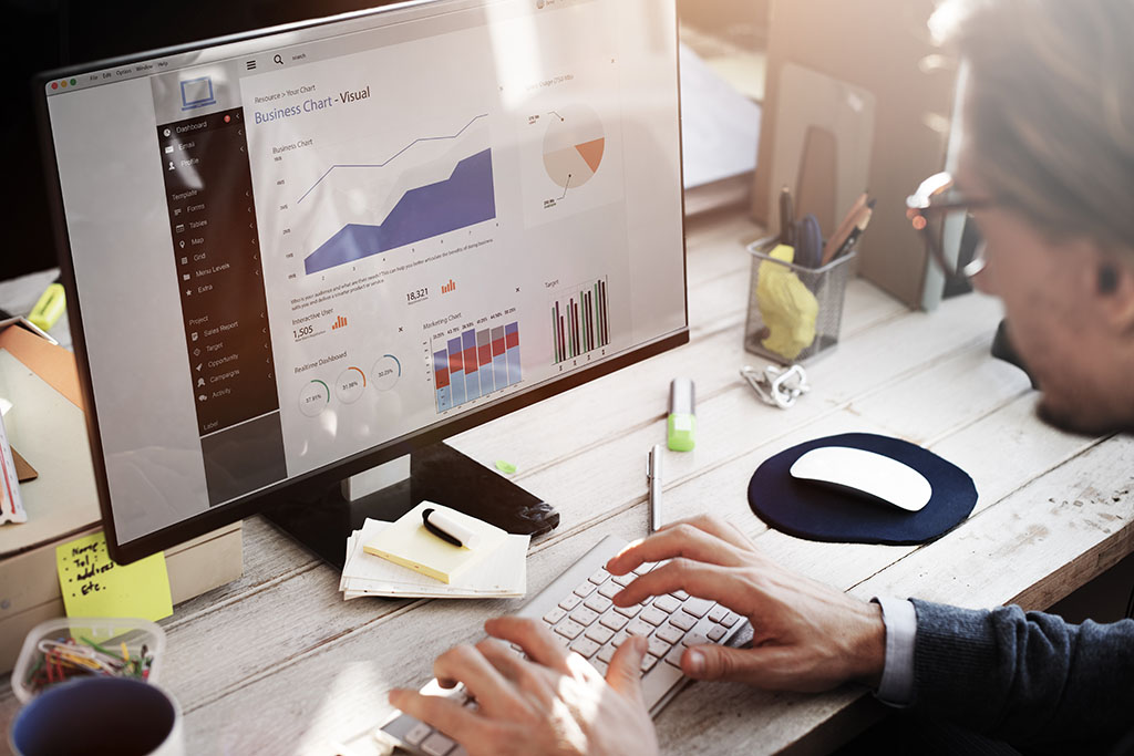 Businessman working on a dashboard