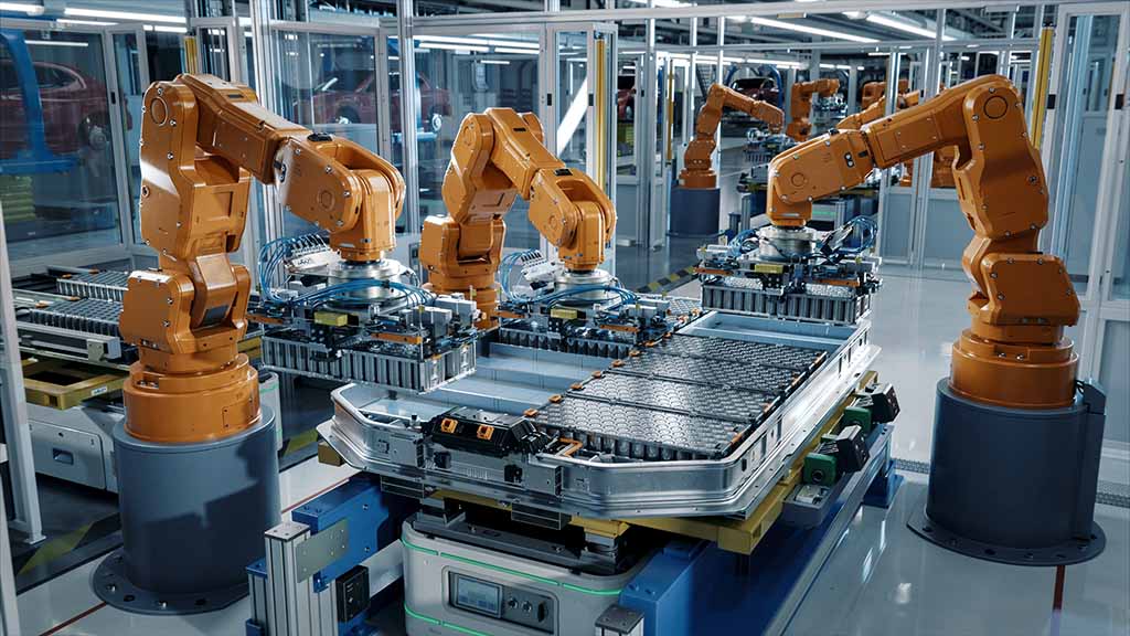 Industrial robot arms on a production line