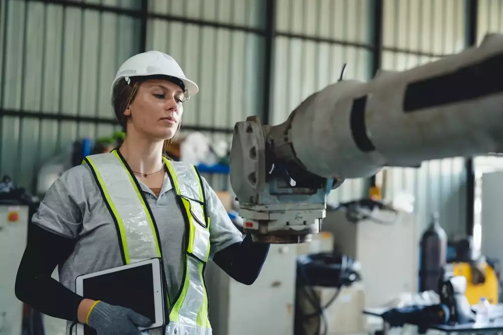 An industrial engineer checking equipment
