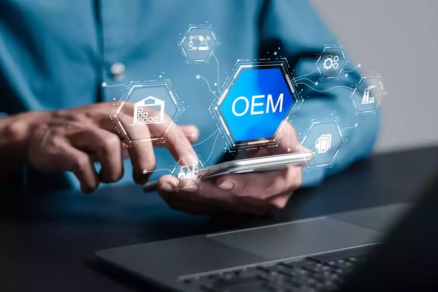 Businessman using a digital interface displaying the term OEM